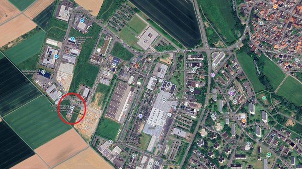 Übersichts-Luftbild des Gewerbegebiets mit Markierung der neuen Firmenadresse